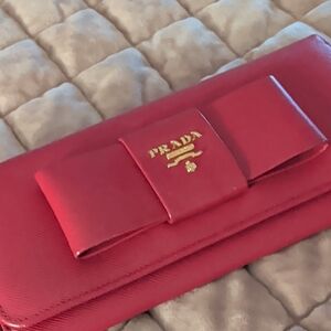 Prada Red Bow Continental Wallet with Gold Logo